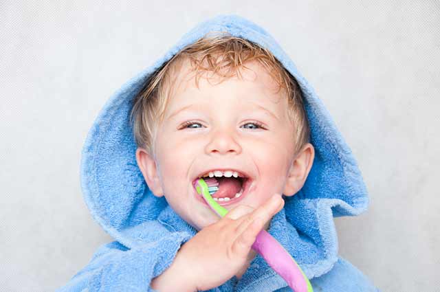 general dentistry kid brushing his teeth